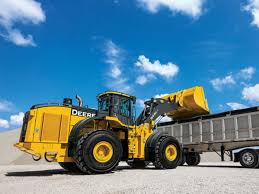 Who buys construction heavy equipment in USA and Canada